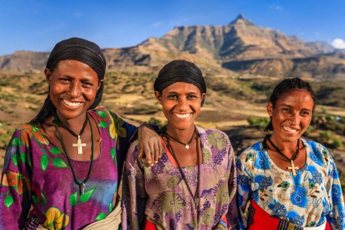 Ethiopian women in front of a mountain